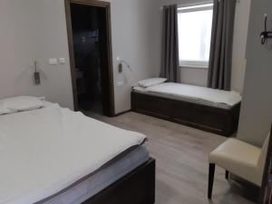 Posteľ alebo postele v izbe v ubytovaní Apartment Lizzi.