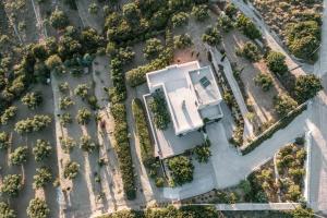 an overhead view of a house in a garden at Villa Iris in Livadi