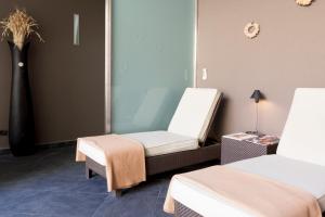 Łóżko lub łóżka w pokoju w obiekcie Oca Vila de Allariz Hotel Balneario