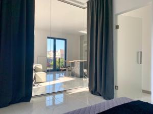 Posteľ alebo postele v izbe v ubytovaní EL Apartments - Antares