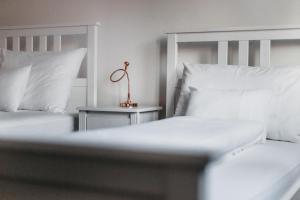 Postel nebo postele na pokoji v ubytování Bond Apartment