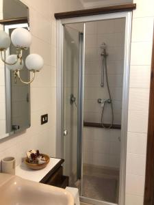 a bathroom with a shower and a sink at Rayon de Soleil in Saint Vincent