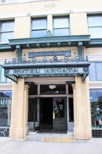 a building with a sign on the front of it at Hotel Arcata in Arcata