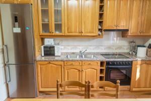 A kitchen or kitchenette at VuT El Pozo la Carrera