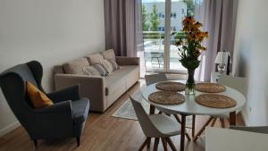 Posedenie v ubytovaní Apartament WILKASY (k. Giżycka)