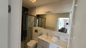 Kúpeľňa v ubytovaní Apartament WILKASY (k. Giżycka)