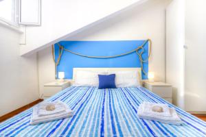 A bed or beds in a room at Il Nodo