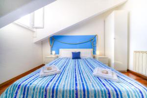 A bed or beds in a room at Il Nodo