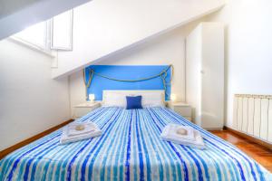 A bed or beds in a room at Il Nodo