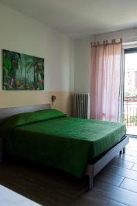 Postel nebo postele na pokoji v ubytování Lorenteggio 209