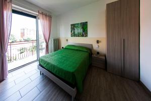 Postel nebo postele na pokoji v ubytování Lorenteggio 209