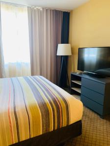 Легло или легла в стая в Country Inn & Suites by Radisson, San Jose International Airport, CA