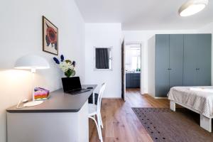 Posteľ alebo postele v izbe v ubytovaní Apartment MERAN
