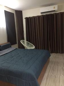 Postel nebo postele na pokoji v ubytování Lampang Ngeng Na Home