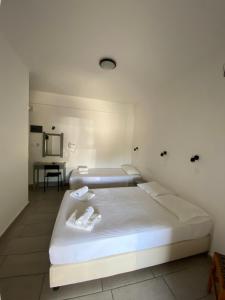 Posteľ alebo postele v izbe v ubytovaní Deep Blue Rooms & Apartments
