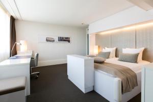 Postel nebo postele na pokoji v ubytování Holiday Inn Eindhoven Centre by IHG