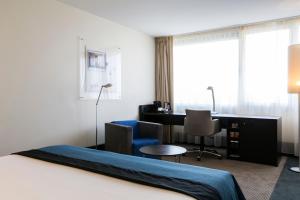Postel nebo postele na pokoji v ubytování Holiday Inn Eindhoven Centre by IHG