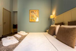 Posteľ alebo postele v izbe v ubytovaní Marlin Rooms