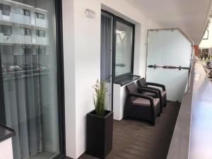 Posedenie v ubytovaní AMD Apartamenty Bliżej Morza