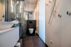 Kúpeľňa v ubytovaní Apartament WIDOK + 4 fotografie