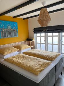 Postel nebo postele na pokoji v ubytování Appartement Bos en Duin