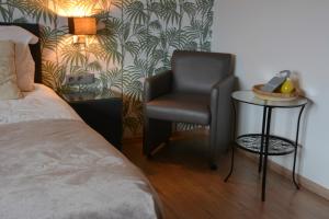 Postel nebo postele na pokoji v ubytování B&B Afrodite