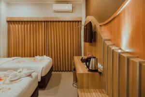 Voodi või voodid majutusasutuse panfila hotel toas