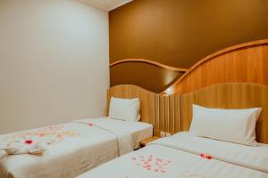 Voodi või voodid majutusasutuse panfila hotel toas