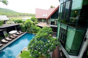 an aerial view of a building with a swimming pool at Kireethara Boutique Resort in Chiang Mai