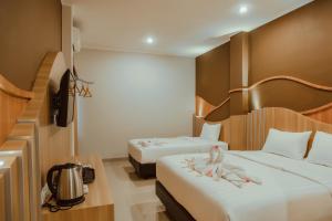 Voodi või voodid majutusasutuse panfila hotel toas