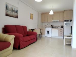 A kitchen or kitchenette at Apartamento frente de la playa