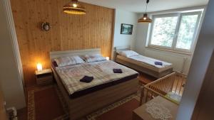 Ein Bett oder Betten in einem Zimmer der Unterkunft Privat BEA