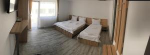 Postel nebo postele na pokoji v ubytování Panoramic