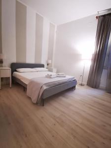 Cama ou camas em um quarto em Palermo Inn Apartment