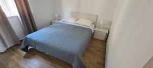 Postel nebo postele na pokoji v ubytování Villa Aninka