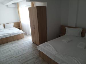Postel nebo postele na pokoji v ubytování Panoramic