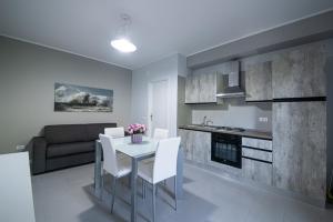 A kitchen or kitchenette at Residence l'Ogliastro