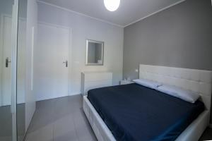 A bed or beds in a room at Residence l'Ogliastro