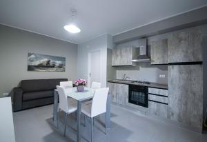 A kitchen or kitchenette at Residence l'Ogliastro