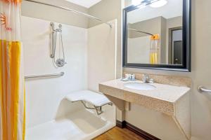 a bathroom with a sink and a shower at La Quinta by Wyndham Oklahoma City - Moore in Moore