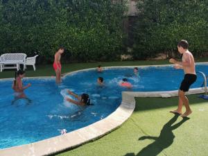 The swimming pool at or close to Aparthotel Lucky Family