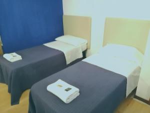 Postel nebo postele na pokoji v ubytování bellaria