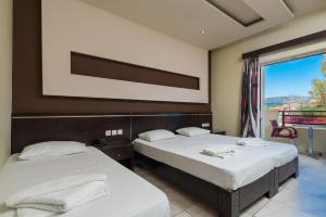 Postel nebo postele na pokoji v ubytování Canadian Hotel