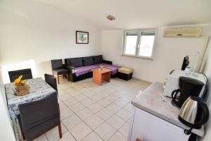 Kuchyň nebo kuchyňský kout v ubytování Apartmani LUNA