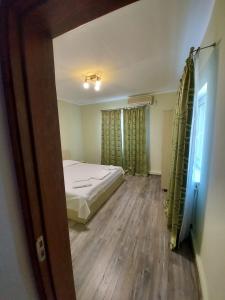 Postel nebo postele na pokoji v ubytování Casa Atlas