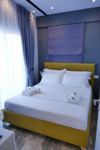 Postel nebo postele na pokoji v ubytování Blue Water Hotel Ksamil