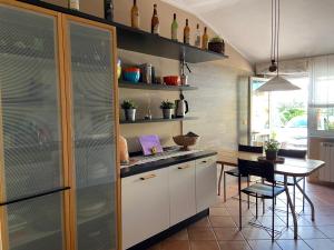 Kuchyň nebo kuchyňský kout v ubytování Casa Rosaria