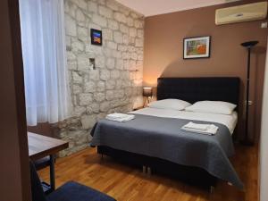Postel nebo postele na pokoji v ubytování Carol Rooms