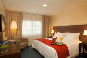 Postel nebo postele na pokoji v ubytování Hotel Bahia Redonda