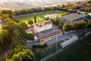 an overhead view of a building in a city at Hotel Ostello Settecolli Sport in Filottrano